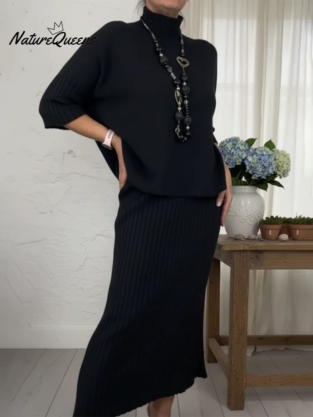 Elegant two-piece set: knitted turtleneck sweater and skirt